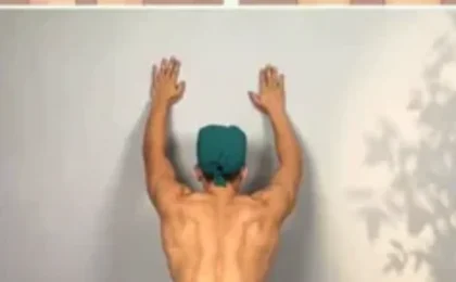 Woman doing a side plank exercise as part of a slim waist transformation routine