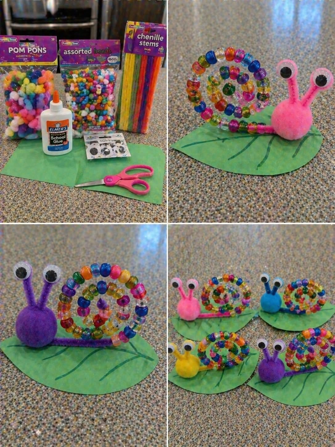Colorful pom pom and bead caterpillar craft resting on a green surface