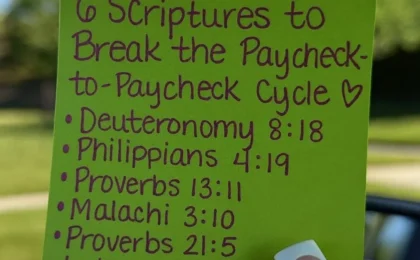 Hand holding a green sticky note listing 6 Bible verses to break the paycheck-to-paycheck cycle against a blue sky.