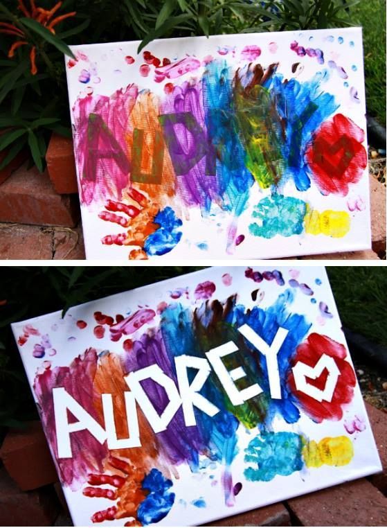 Two stages of colorful canvas art showing a painted background with handprints and name masking tape.