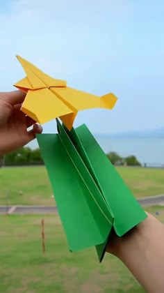 Colorful handmade paper darts being thrown in a playful DIY toy activity