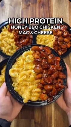 Three-compartment black container with creamy mac and cheese and honey BBQ chicken, text reads High Protein Honey BBQ Chicken.