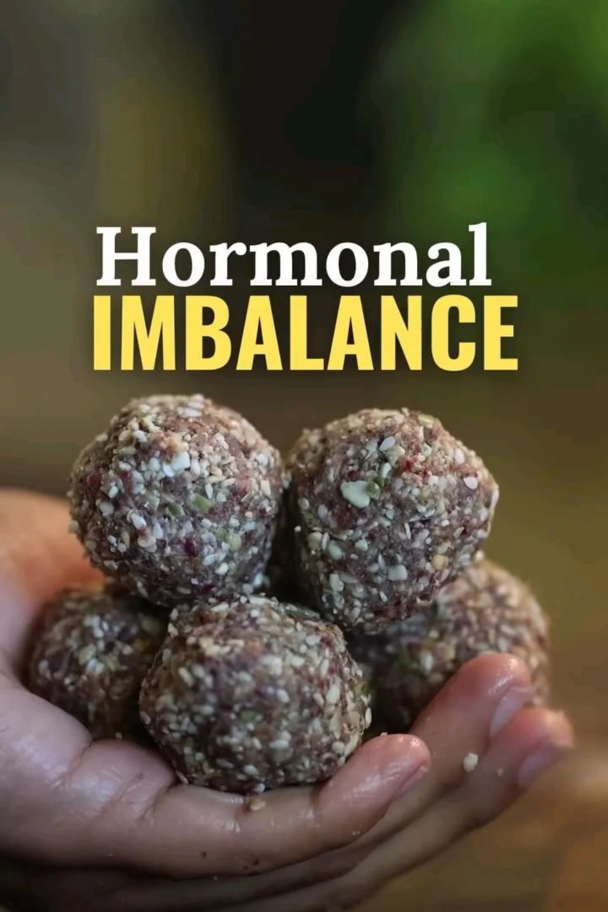 Assorted healthy protein balls with seeds, nuts, and cacao arranged on a wooden board, representing hormonal imbalance.