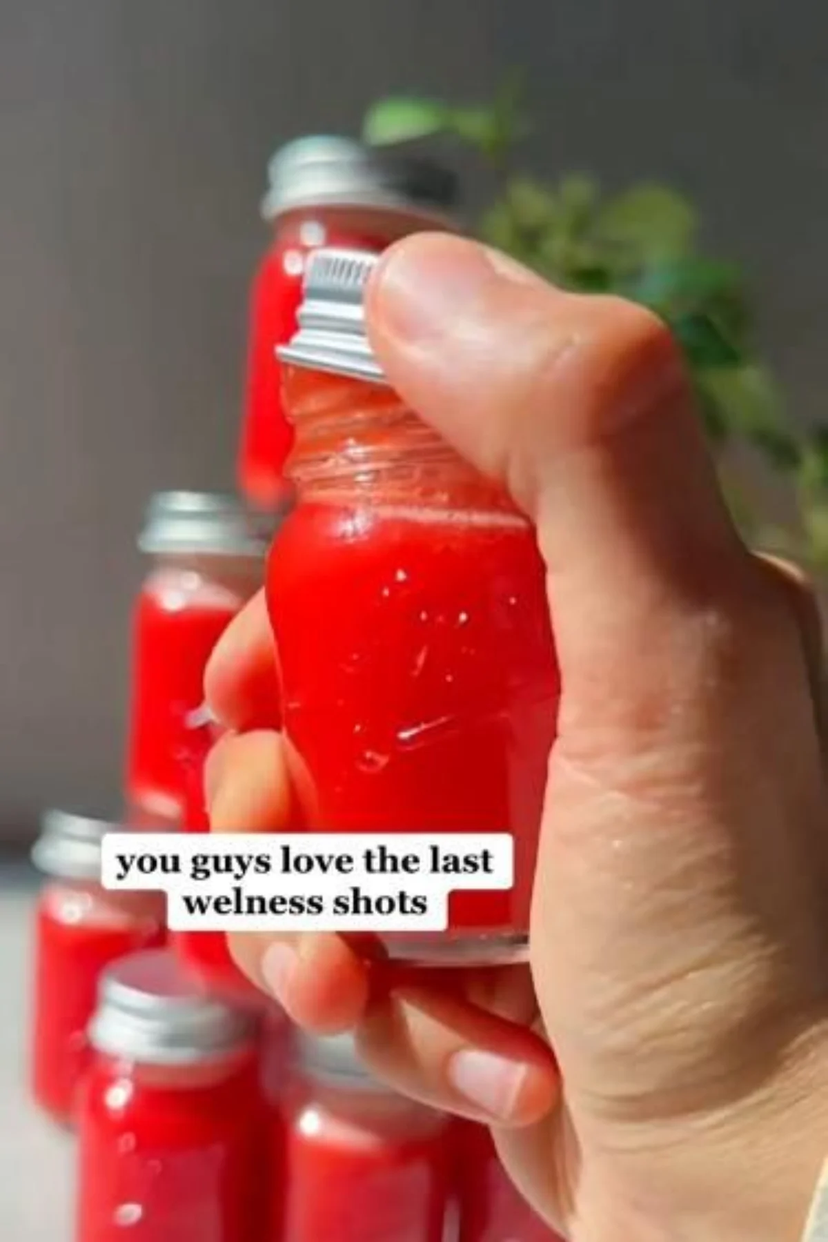 A colorful assortment of small bottles filled with vibrant wellness shots.