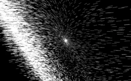 Brilliant white light burst radiating dynamic streaks from a central point against a deep black background.