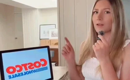 Person reviewing Costco affiliate program dashboard on a laptop at home